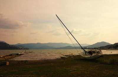 Scenic view of lake against mountain range