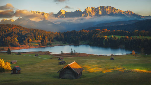 Scenic view of lake against sky during sunset