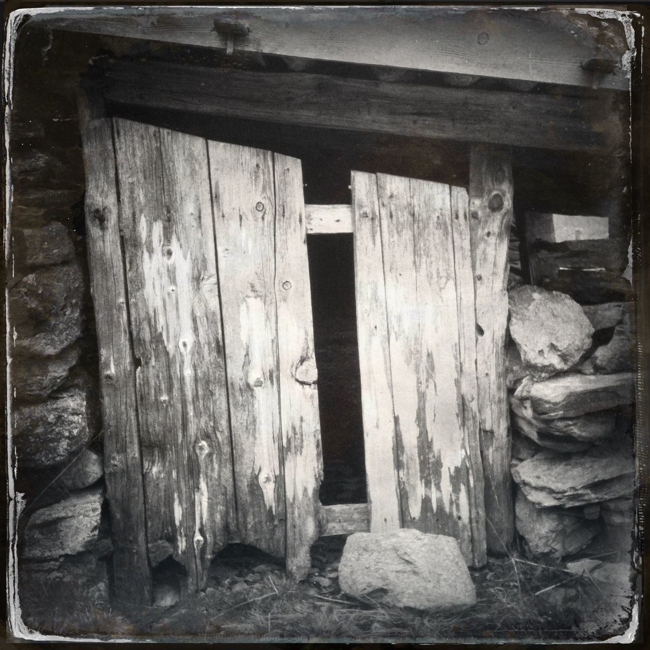 wood - material, wooden, old, weathered, built structure, wood, door, architecture, abandoned, damaged, plank, transfer print, house, obsolete, auto post production filter, closed, building exterior, deterioration, run-down, entrance