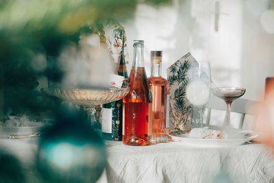 Close-up of wine bottles on table