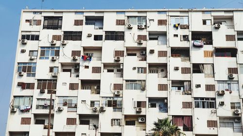 Low angle view of residential building against sky