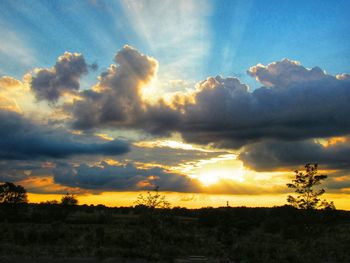 Scenic view of dramatic sky during sunset