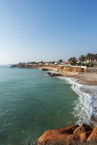 Scenic view of sea against clear sky