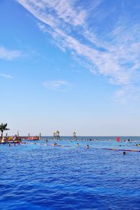 Scenic view of sea against blue sky