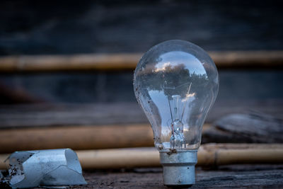 Close-up of light bulb against blurred background