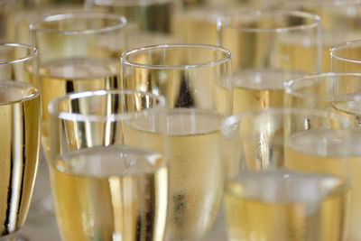 Close-up of wineglasses on table