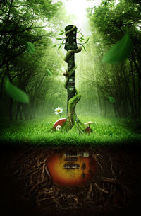 Digital composite image of guitar growing from ground