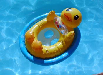 High angle view of inflatable floating on water in swimming pool