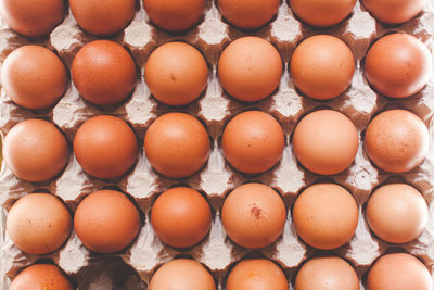 Full frame shot of eggs in carton