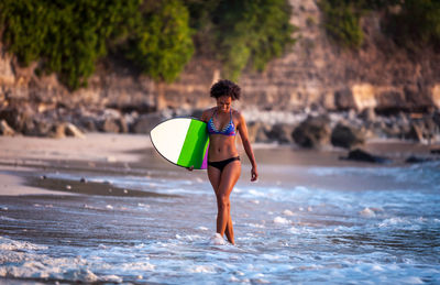 Rear view of woman on beach