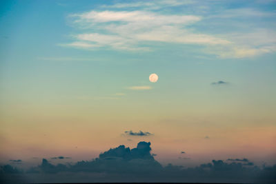 Scenic view of moon at sunset