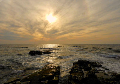 Scenic view of sea against sky during sunset