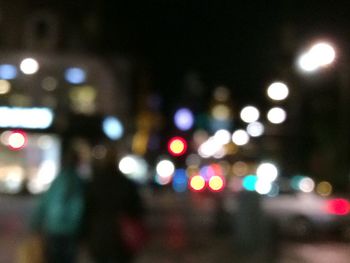 Defocused image of illuminated city street