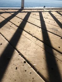 High angle view of shadow on beach