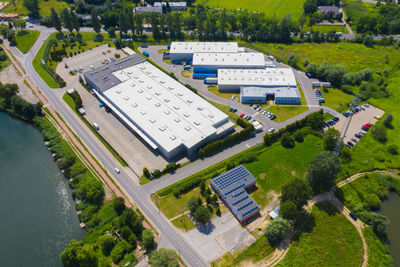 Aerial drone on trucks and logistic center. warehouse aerial. modern logistics center, white van