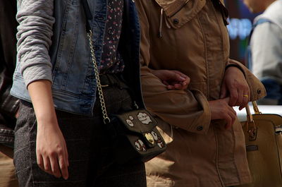 Close-up of friends standing outdoors