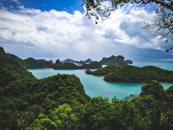 Scenic view of sea against cloudy sky