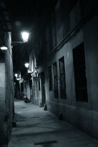 Empty narrow alley at night