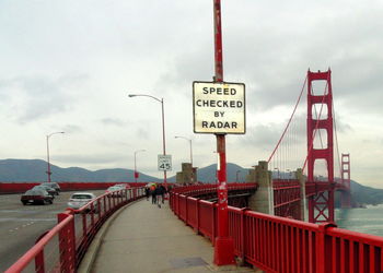 View of suspension bridge over sea