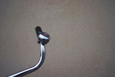 High angle view of bike handlebar