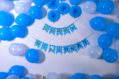 Low angle view of multi colored balloons