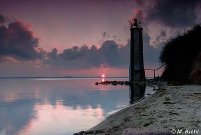 Scenic view of sea at sunset