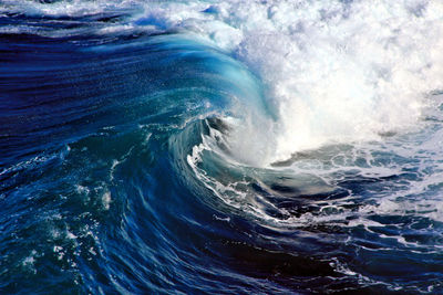 Scenic view of sea against blue sky