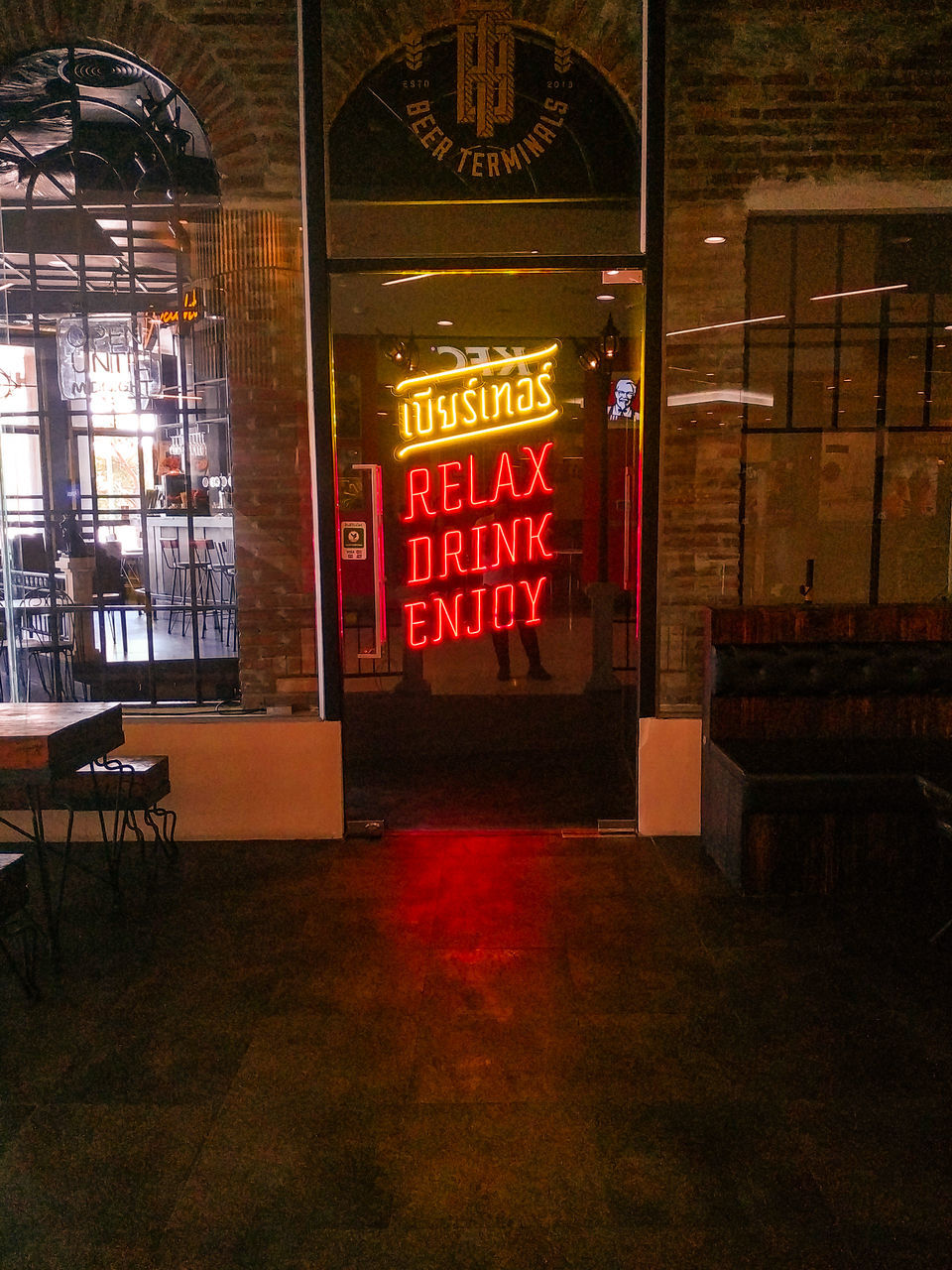 EMPTY CHAIRS AND TABLES IN RESTAURANT