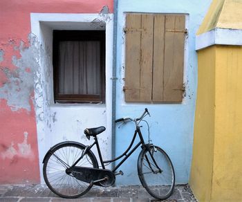 Bicycle against house