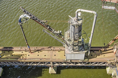 High angle view of rope on bridge over river