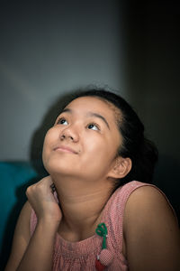 Portrait of smiling woman at home