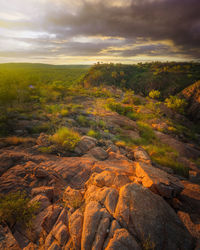 Scenic view of landscape against cloudy sky