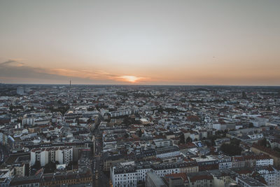 High angle view of townscape against sky during sunset