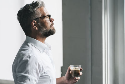 Businessman enjoying his coffee