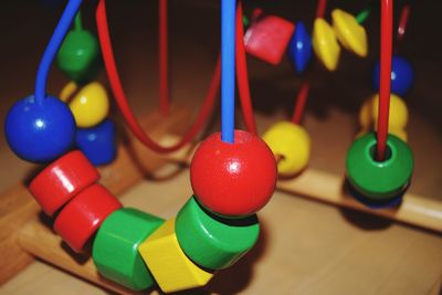 Close-up of multi colored toys on table