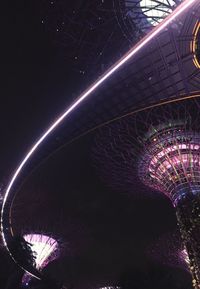 Low angle view of illuminated building at night