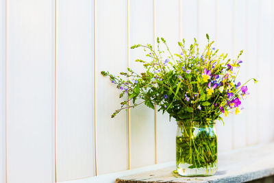 Close-up of flower pot on table