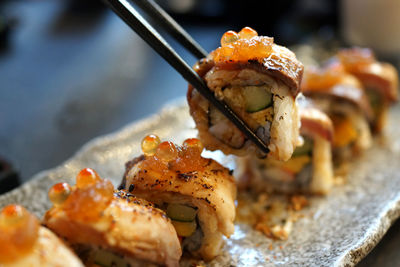 Close-up of sushi served in plate