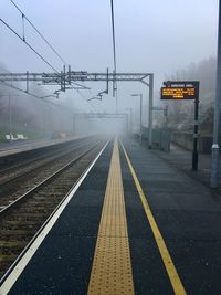 Railroad tracks against sky