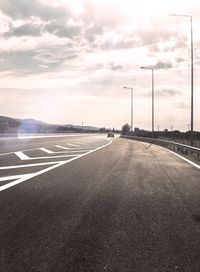 View of road against cloudy sky