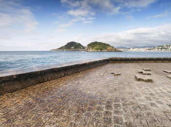 Scenic view of beach against sky