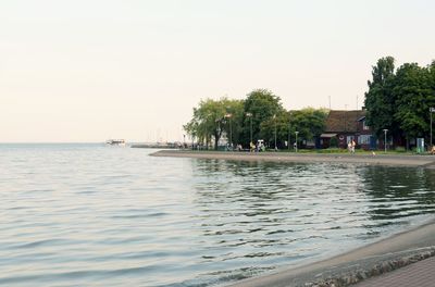 Calm sea against clear sky