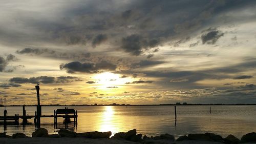 Scenic view of sea against cloudy sky