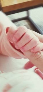 Close-up of woman holding hands