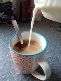 Close-up of coffee cup on table