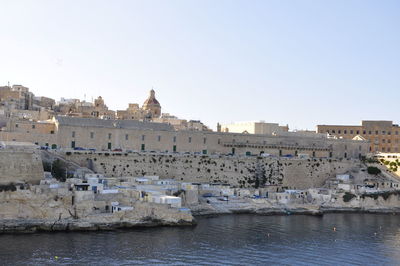 View of townscape in front of river