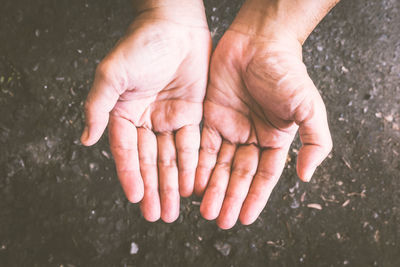 Close-up of person holding hands