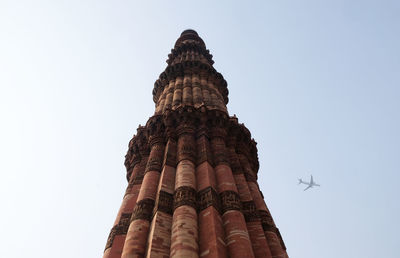 Low angle view of statue against sky