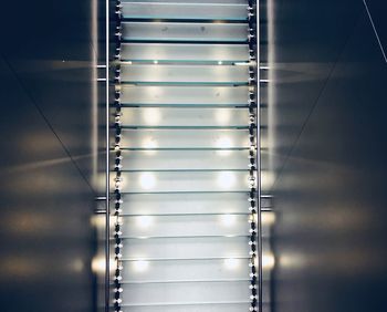 Close-up of blinds against sky at home