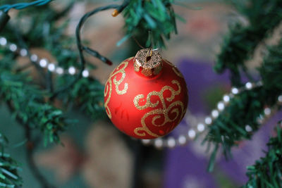 Close-up of christmas decoration hanging on tree